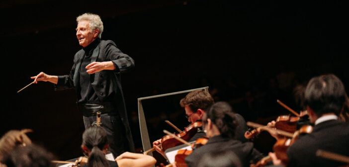 Alexis Hauser conducting the Mcgill Symphony Orchestra