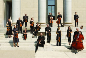 I musici musicians on steps with their instruments